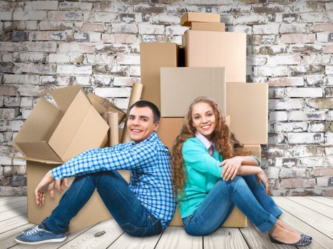 Packed office equipment and furniture ready for relocation
