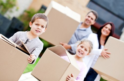 Packed moving boxes and furniture ready for transport