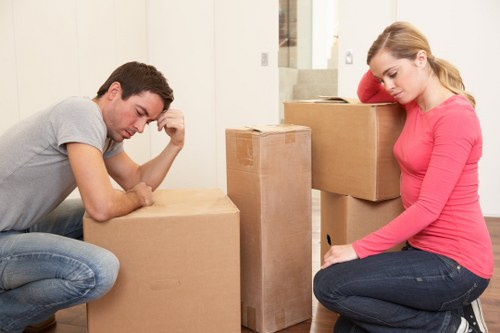 Local packing team preparing fragile items for a move in Motspur Park