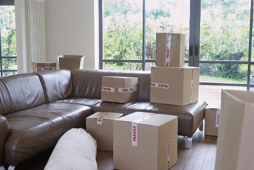Removal van loading household items for a Motspur Park relocation