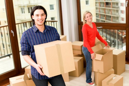 Packed boxes and furniture ready for house removals in Motspur Park